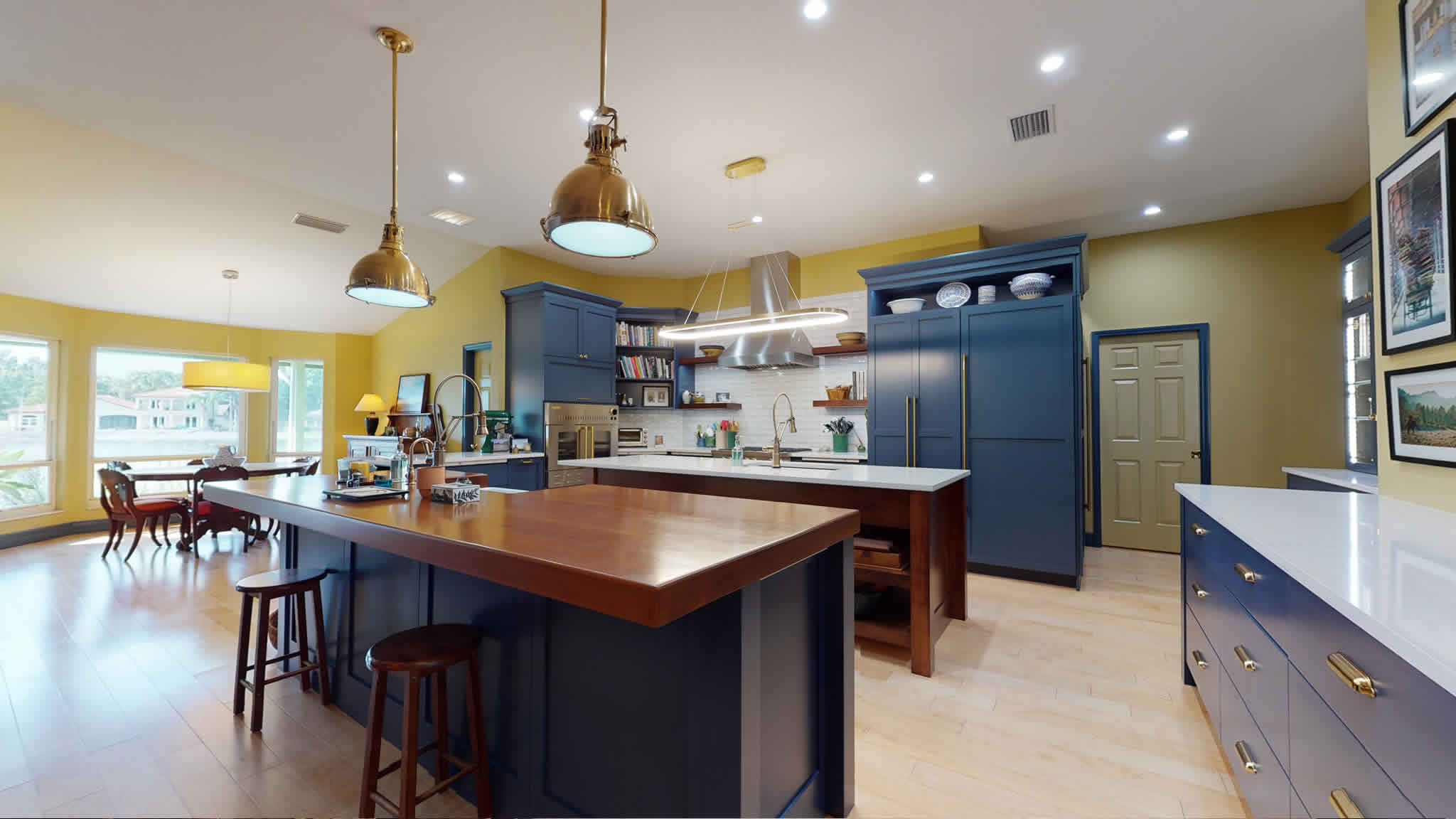 Sleek modern kitchen with eating area